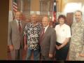 Photo of Chet Edwards with 4 others in office, Army Corp of Engineers