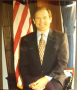 Photos of Chet Edwards next to American Flag (20), in cardboard cover