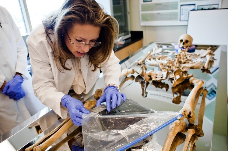 Lori Baker in Lab with Skeleton