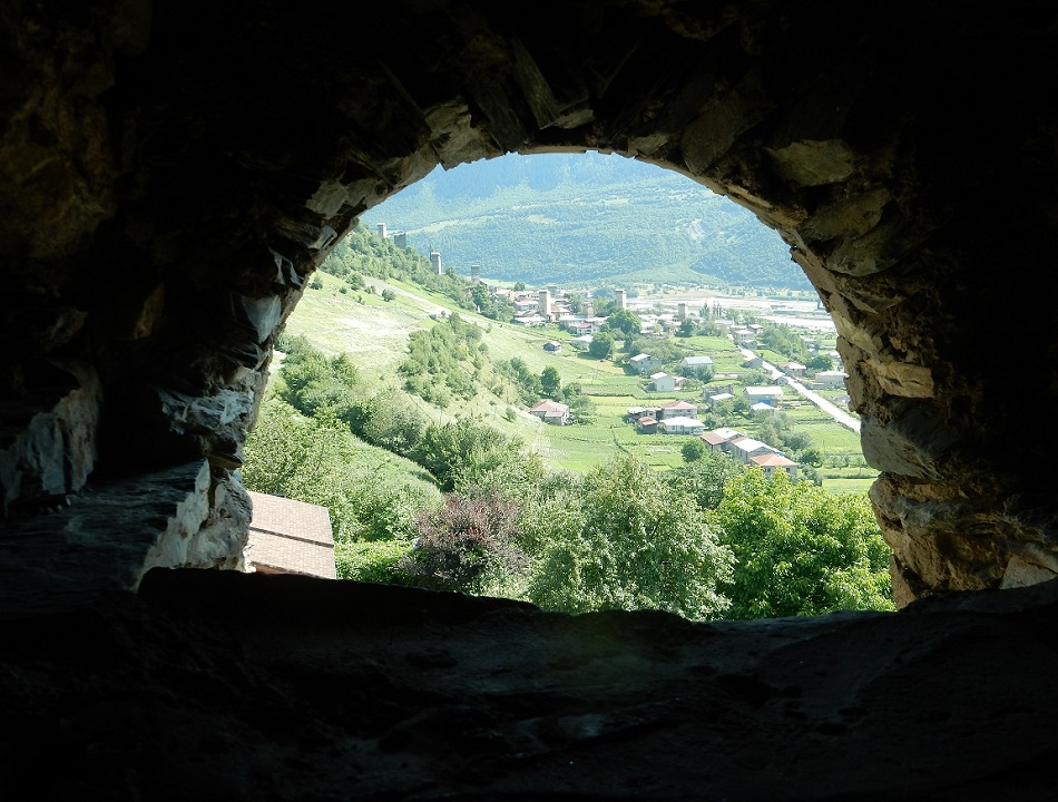 A view of the cityscape looking out of a cavern