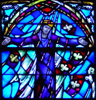 Stained glass window depicting Christ in Armstrong Browning Library