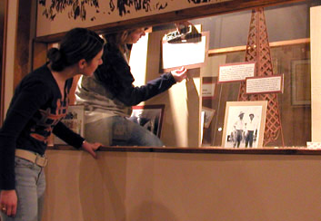 Students install an exhibit at the Texas Ranger Hall of Fame and Museum