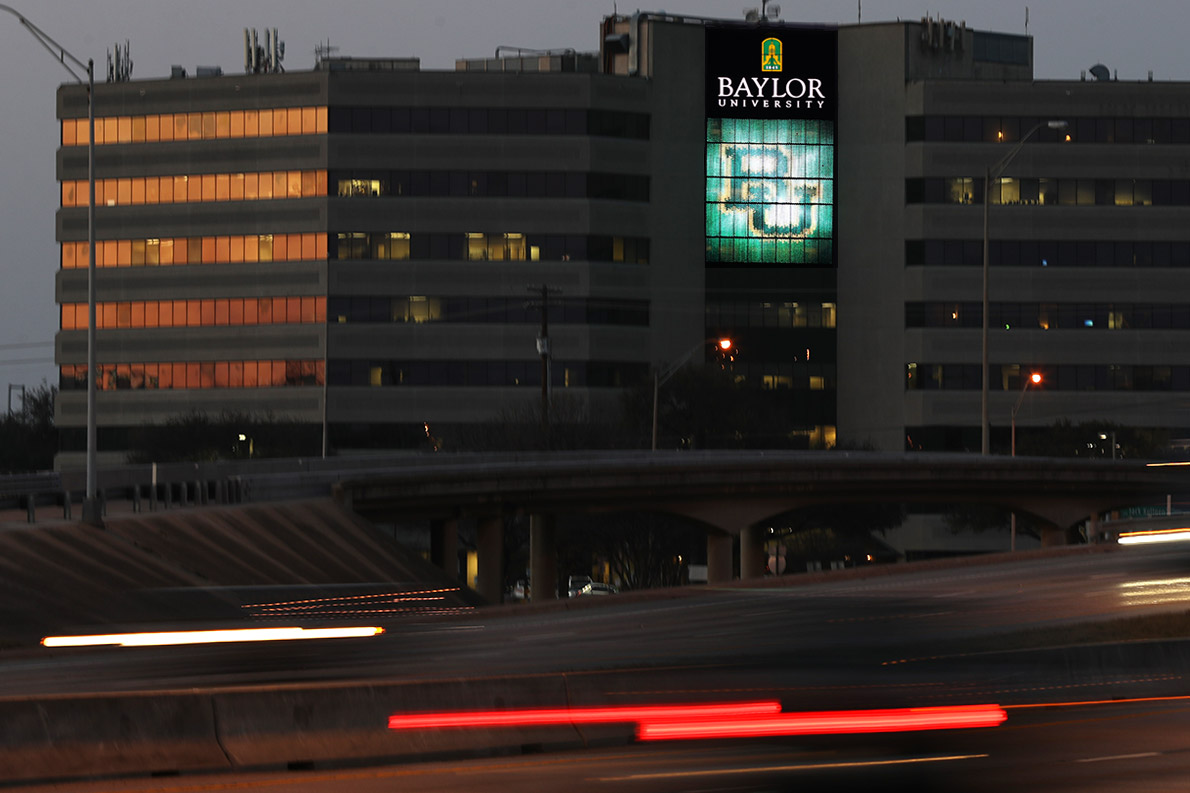 Baylor’s Clifton Robinson Tower was transformed into a digital wallscape to impact busy I-35 through Waco. A similar technology presented campaign messages along Stemmons in Dallas.