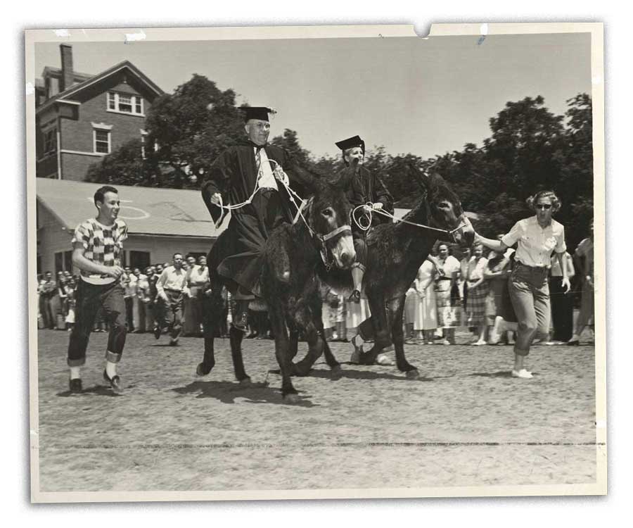 Early Diadeloso style celebration featuring faculty on donkeys