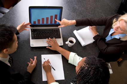 stock photo of a business meeting at a laptop