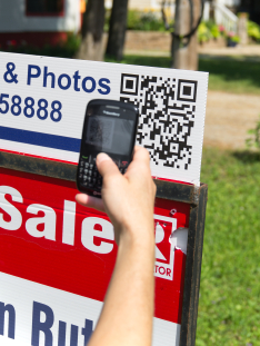 Stock photo of qr code on a for sale sign