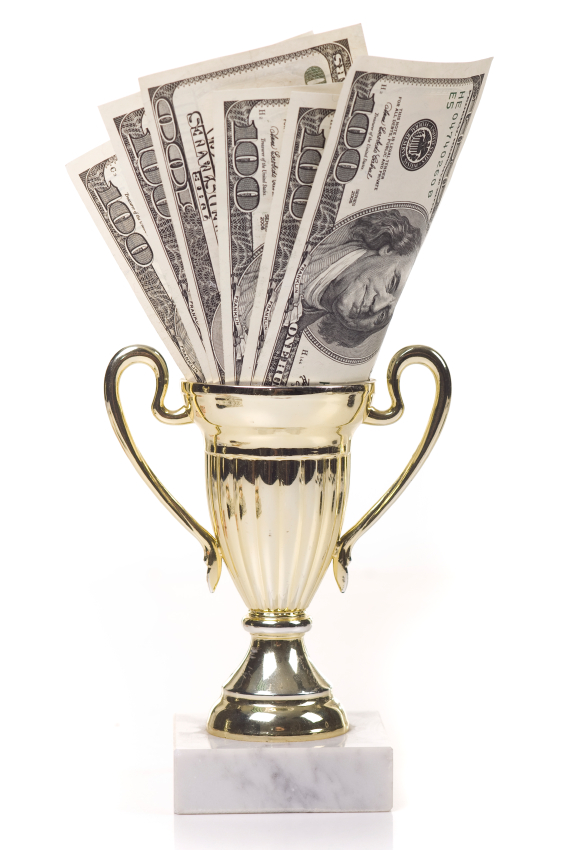 Stock photo of money in a trophy