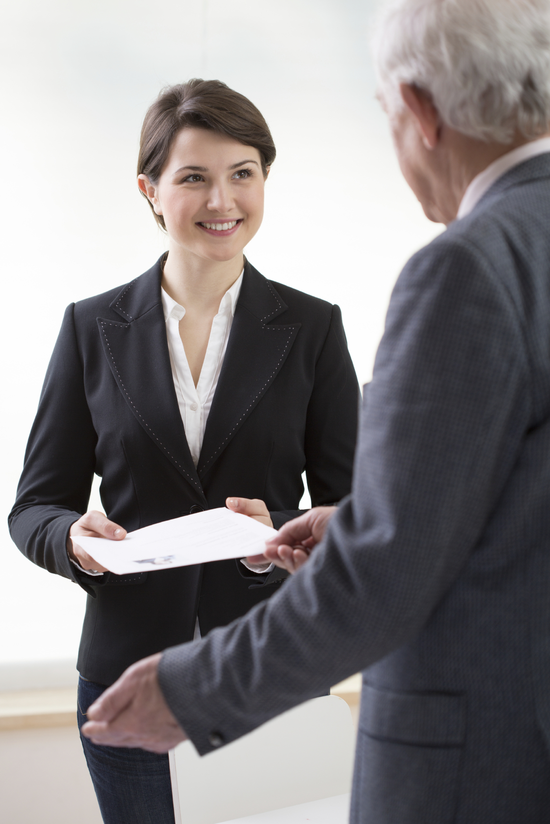 stock photo of a meeting between a businessman and businesswoman