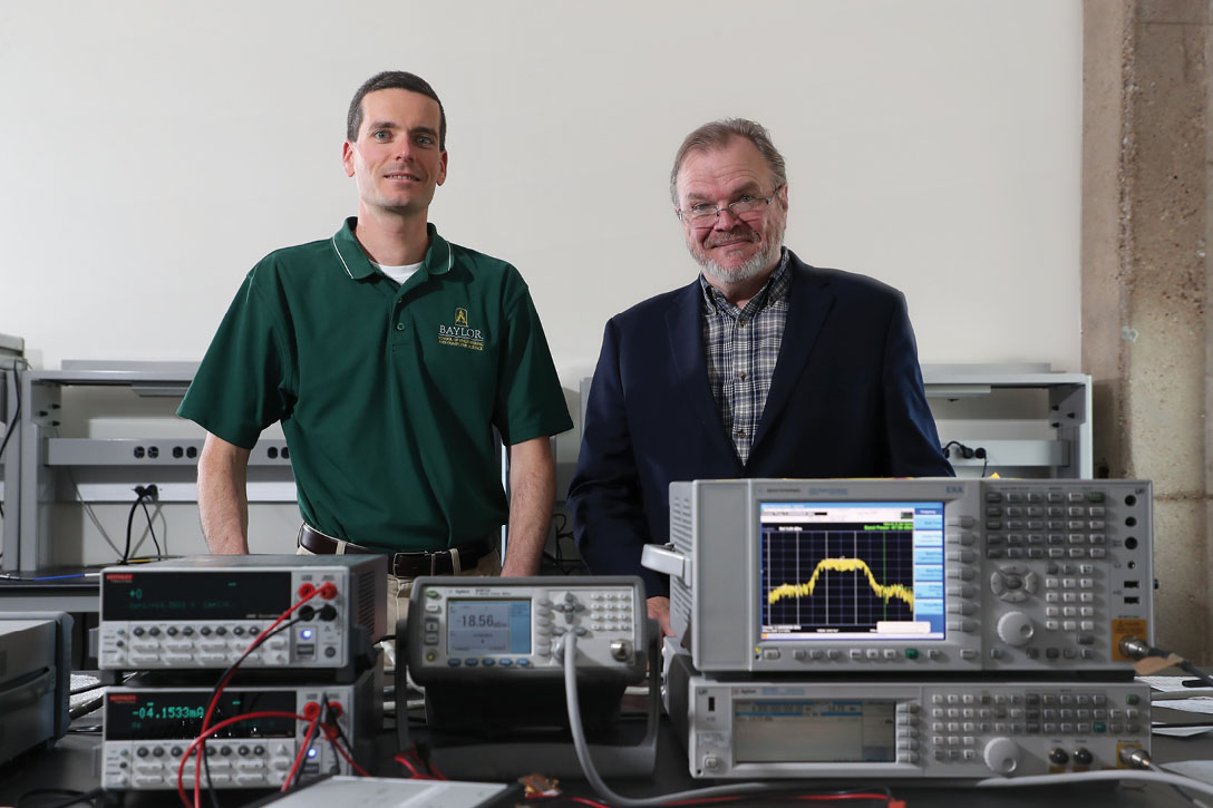 Dr. Charles Baylis and Dr. Robert Marks stand before their radar technology