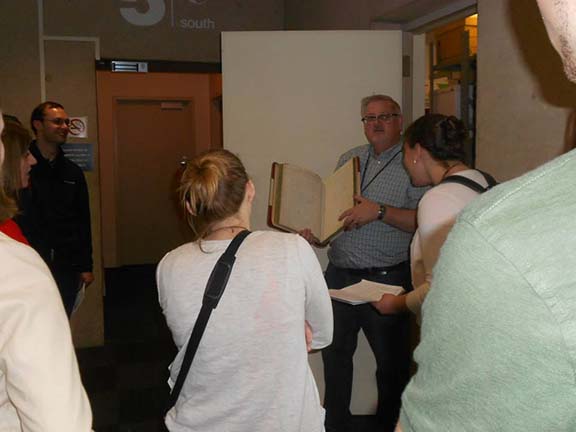 Students in Dr. Julie Holcomb's archives class toured the Dallas Municipal Archives.