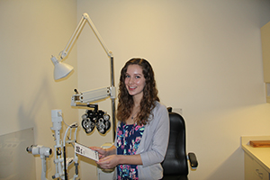 Student at a piece of optometry equipment