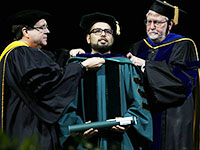 Hooding at August 2018 graduation ceremony