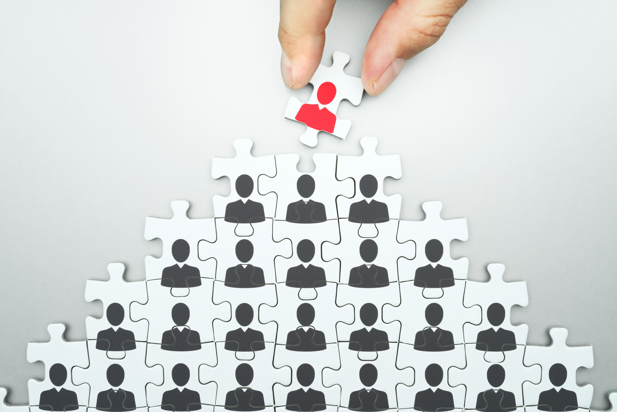 Stock graphic of a puzzle of hierarchy of a company