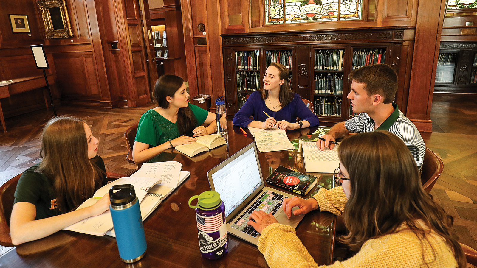 Photo of students studying in Armstrong Browning Library