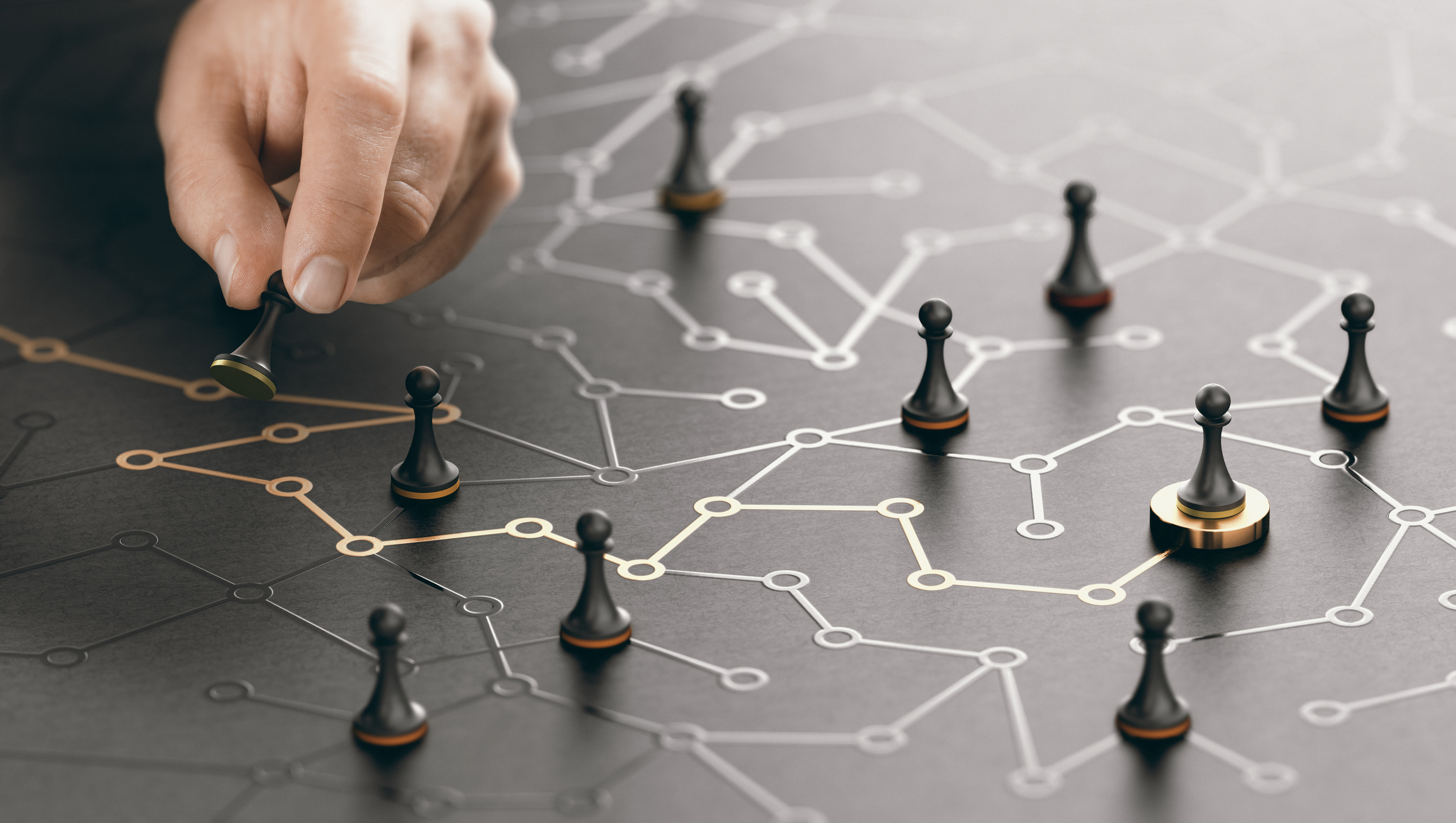 stock photo of person's hands playing board game